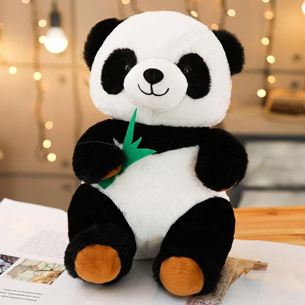 Panda in peluche con la sua foglia di bambù | Peluche Italia