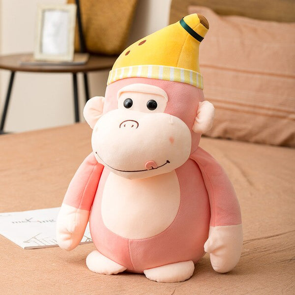 Peluche Scimmia rosa con Cappello a forma di Banana | Peluche Italia