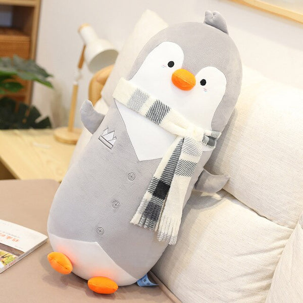 Pinguino grigio in peluche con sciarpa | Peluche Italia